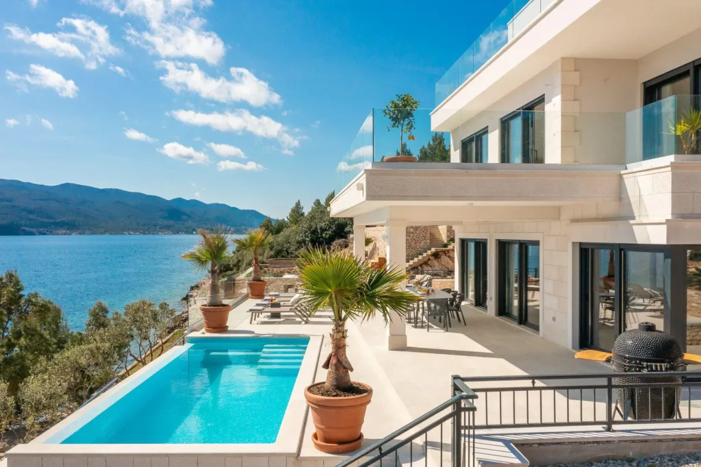 Seafront Villa Maris with private pool and palms facing Korčula in Viganj, Pelješac