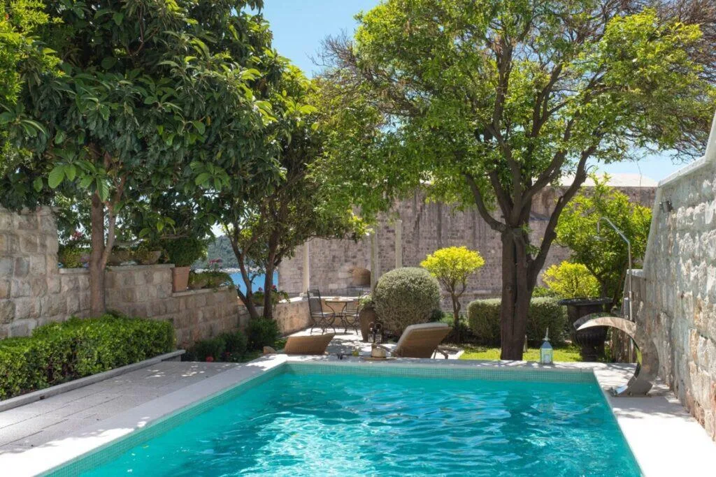 Private pool in a walled garden at 18th-century Villa Revelin near Dubrovnik Old Town
