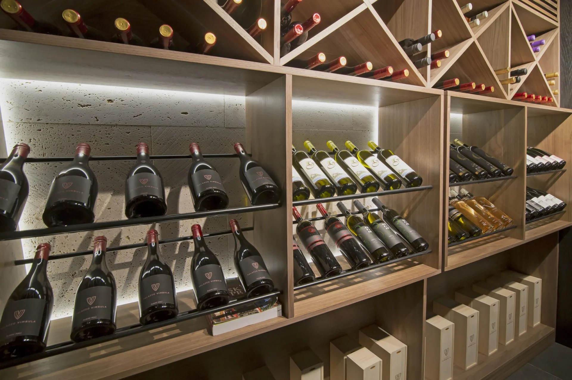 Wine racks with bottles in the cellar at Villa Palazzo