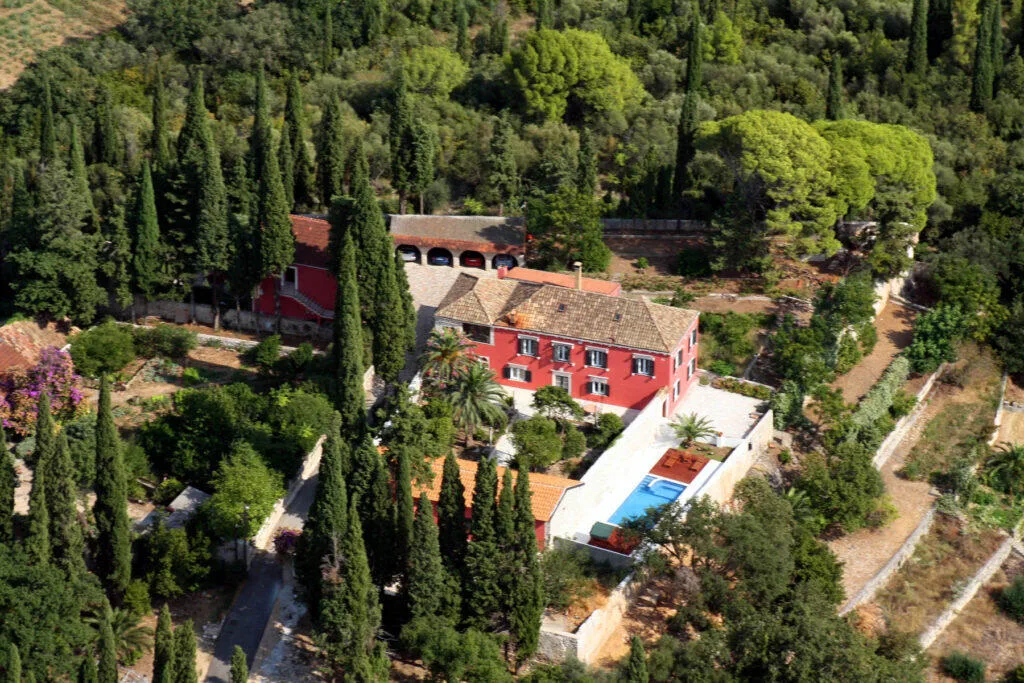 Villa Le Jardin surrounded by cypress gardens above Mlini, aerial view