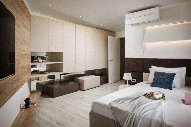 Schlafzimmer mit Queensize-Bett und Schrank im House Bevel