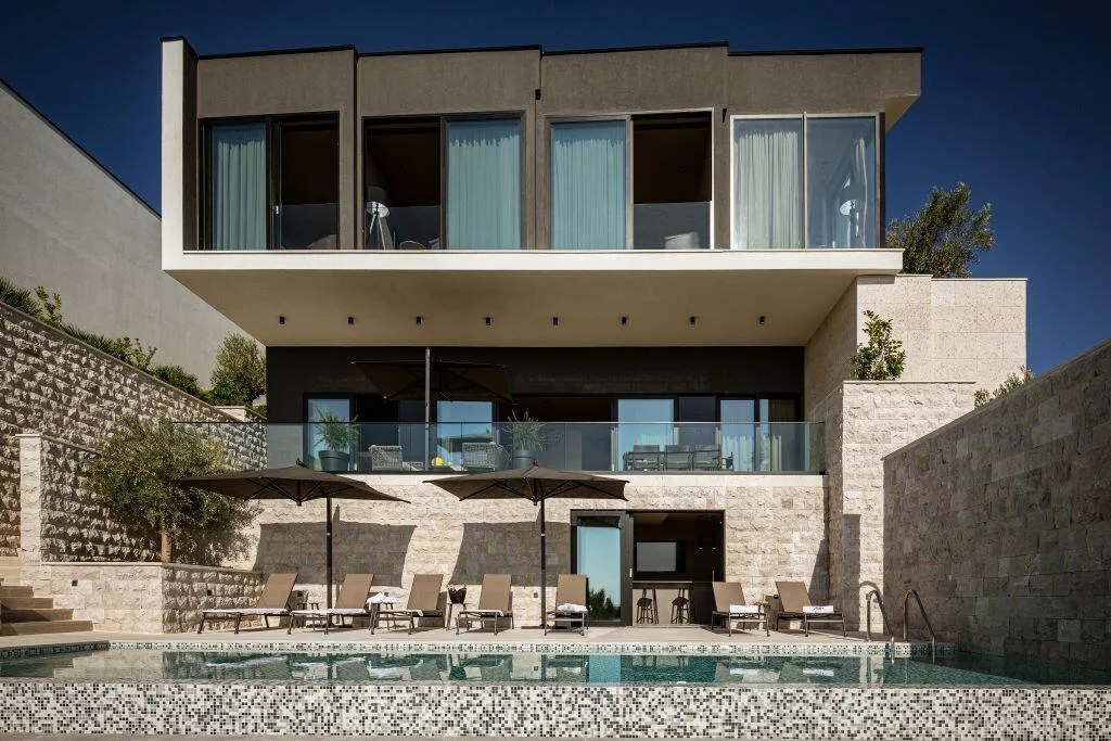 Contemporary façade of Villa La Frida with pool and terraces