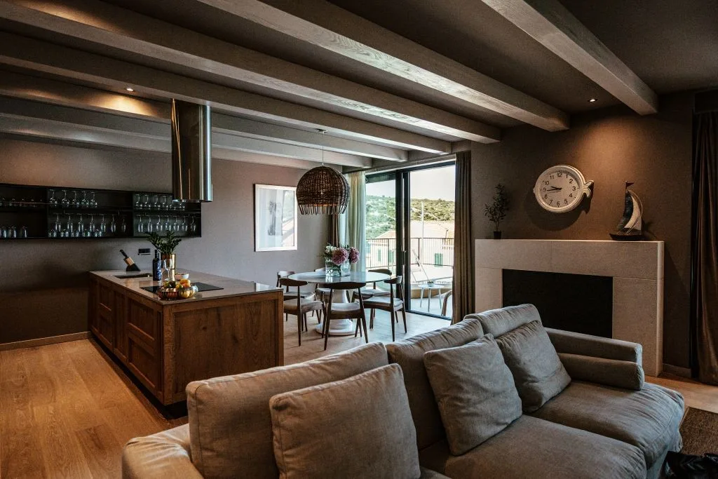 Living room and kitchen island with views to the sea at Villa Sol