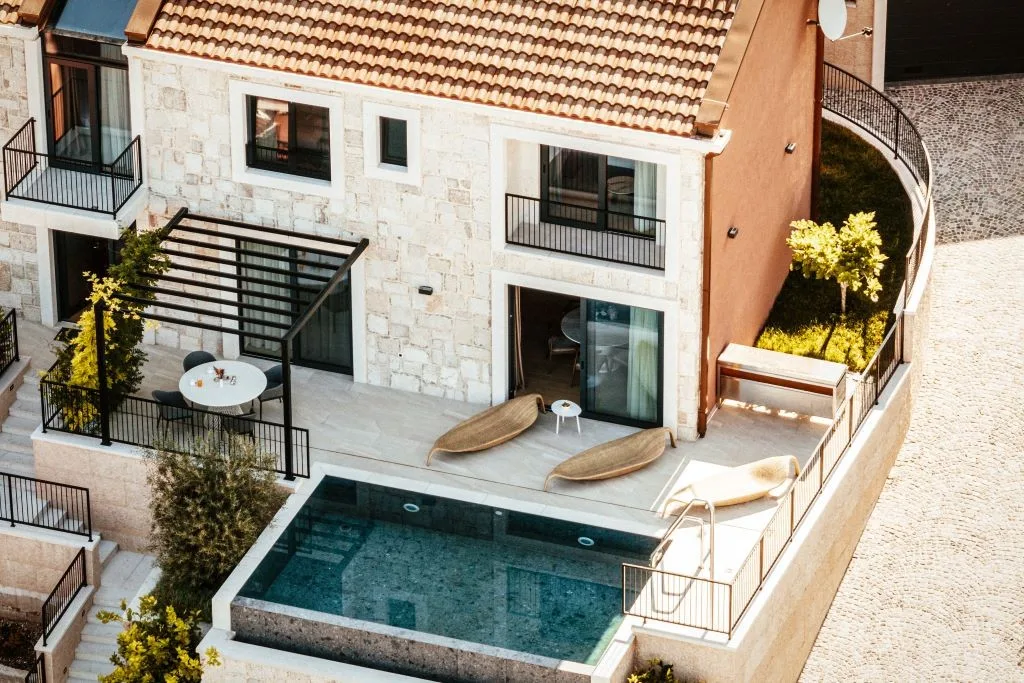 Aerial view of Villa Sol stone house with private pool and terrace in Slano