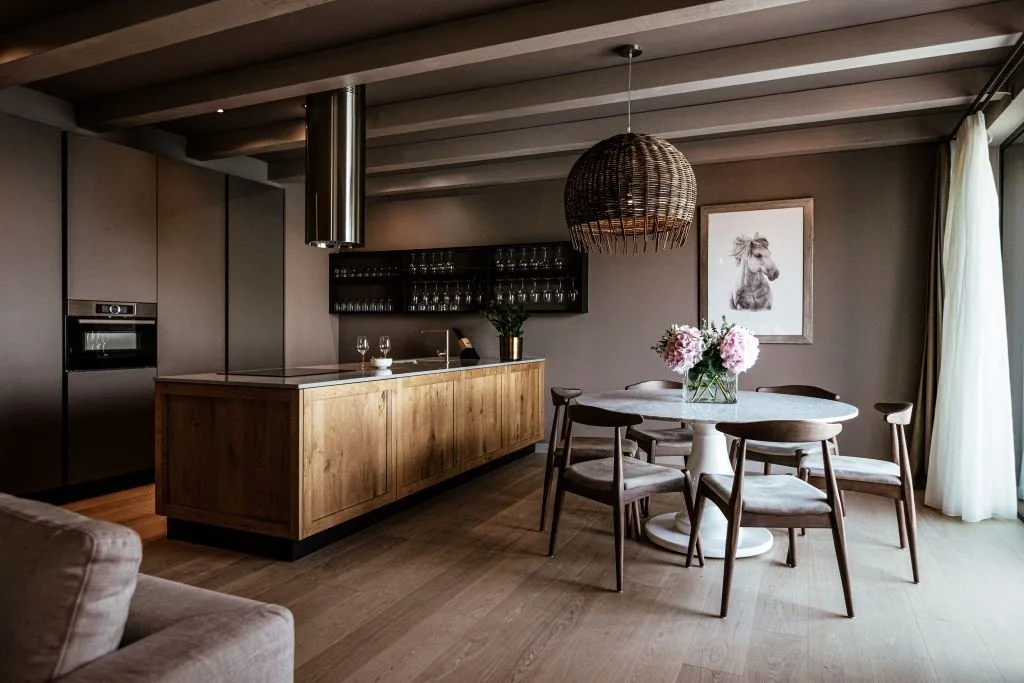Kitchen island and round dining table at Villa Sol in Slano