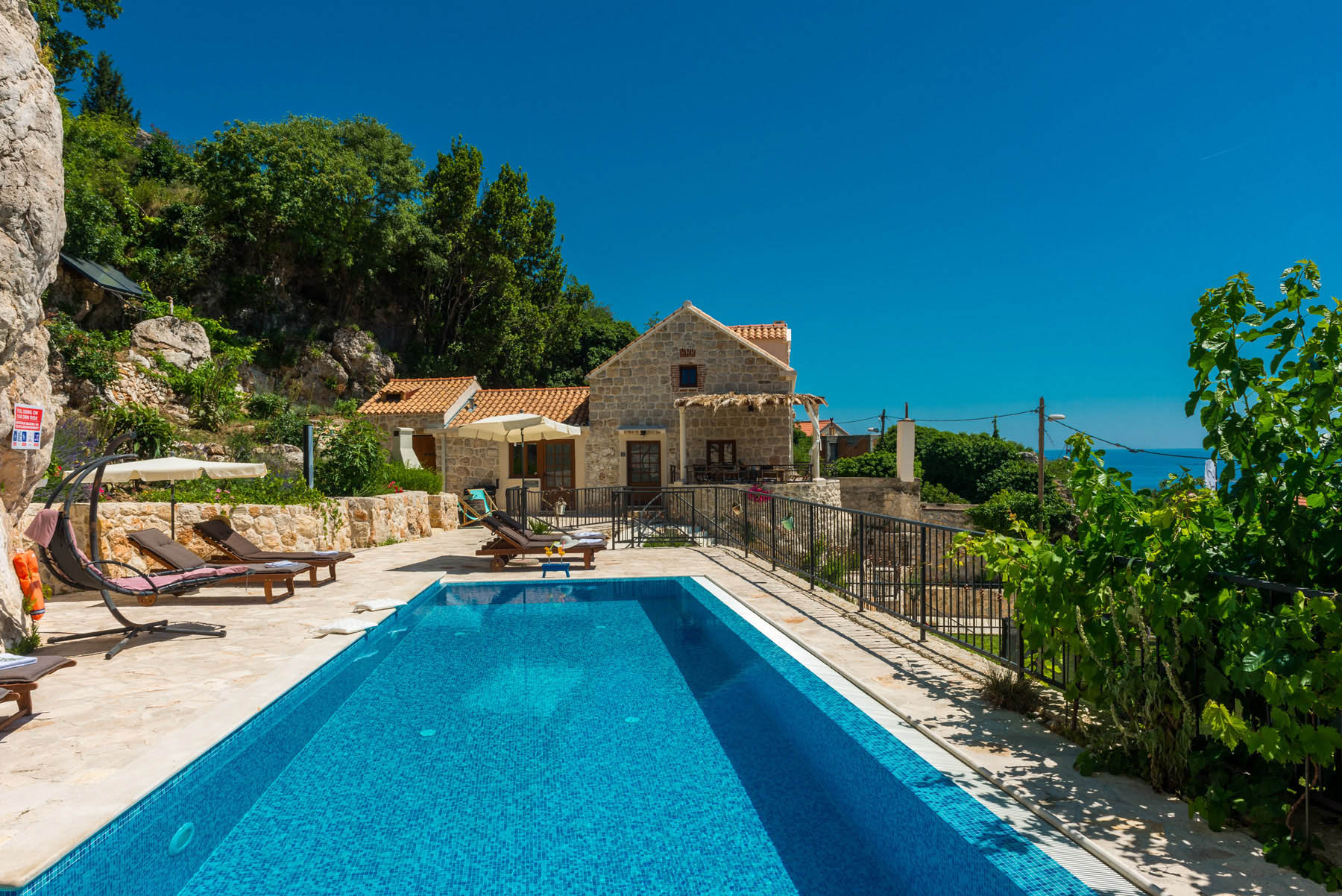 Villa Zeus in Mlini, a traditional Dalmatian stone house with a private swimming pool and sea view near Dubrovnik