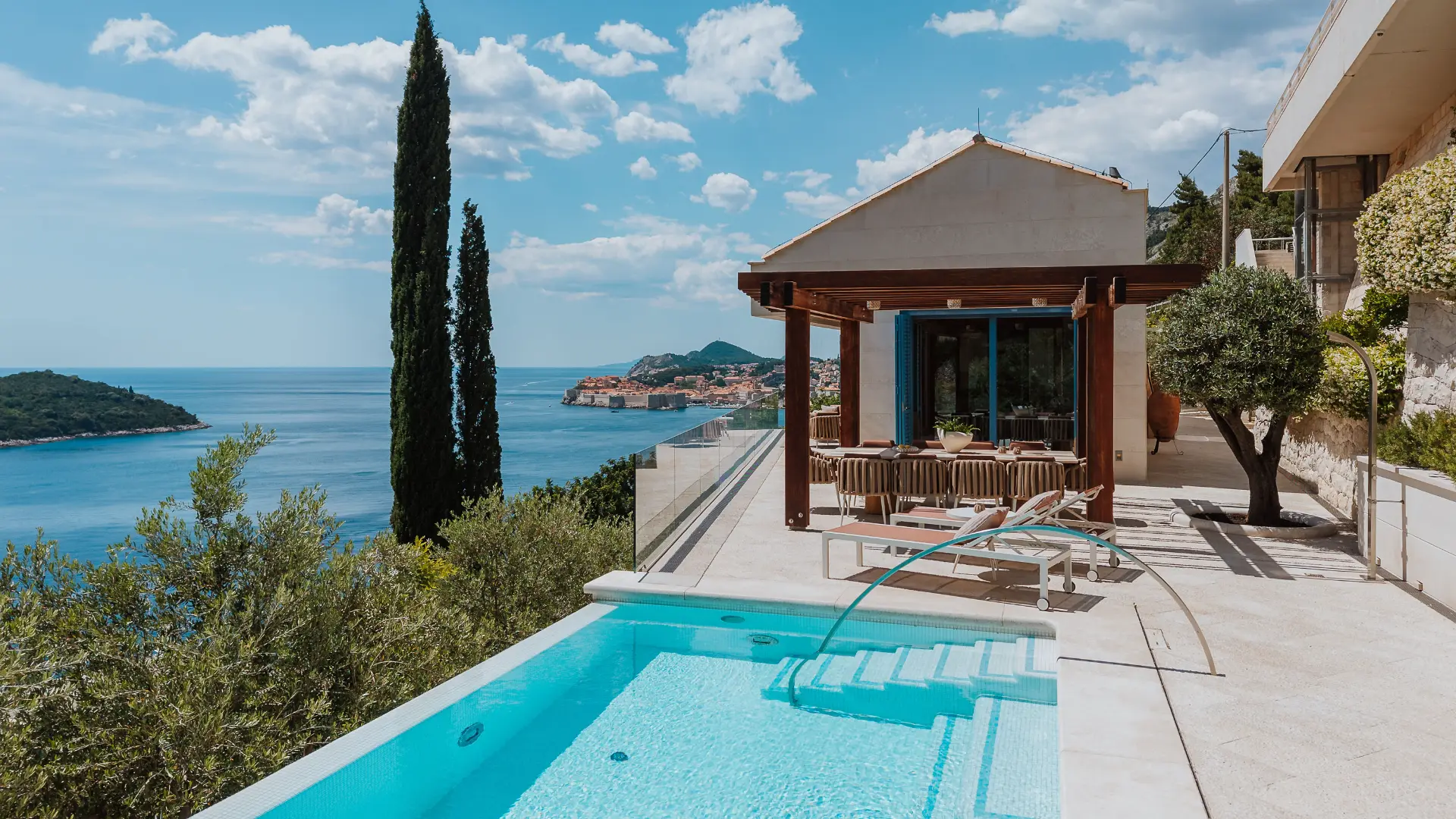 Villa Blazia infinity pool and terrace with pergola, overlooking Dubrovnik Old Town and Lokrum island