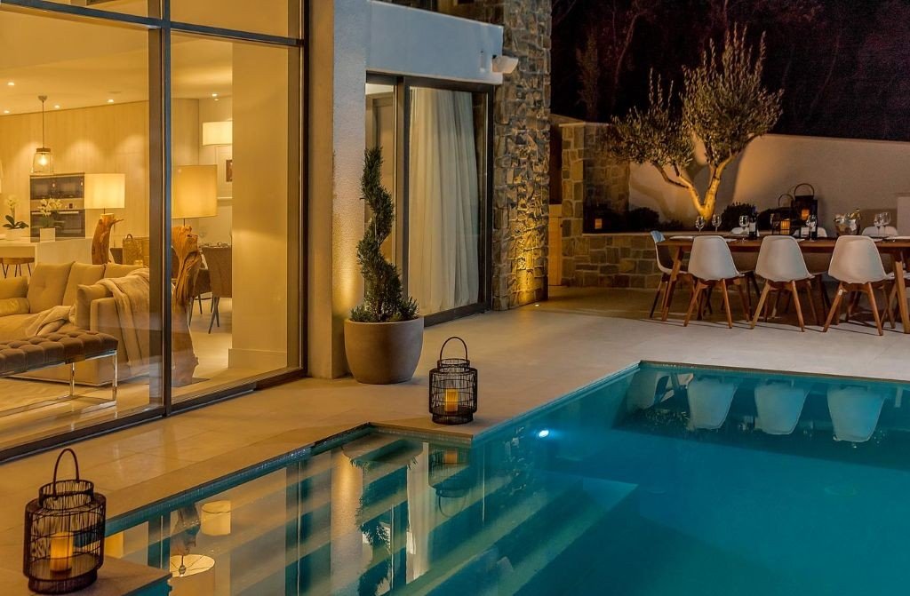 Private pool and lantern-lit terrace at dusk at Villa Opus, Korčula